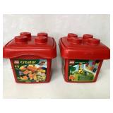 Two Lego Creator Sets in Red Storage Containers Two Lego Creator Sets in Red Storage Containers
