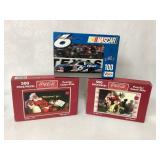 3 Unopened Puzzles Including NASCAR and Coca-Cola