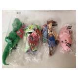 Four Toy Story Plush Figures in Original Packaging