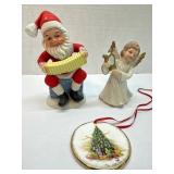 Three Porcelain Decorations Featuring Santa, Angel