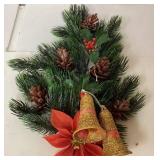 Holiday Decoration Featuring Pinecones, Berries, a