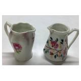 Two Porcelain Creamers with Floral Designs, Approx