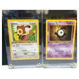 First Edition Sentret and Unown Pokemon Cards in P