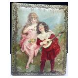 Victorian-Era Photograph Album with Ornate Cover a