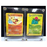 Arcanine and Ivysaur Pokemon Cards in Protective C