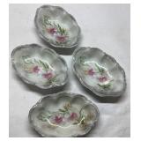 Four Porcelain Trinket Dishes with Floral Design
