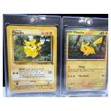 Two Pokemon Pikachu Cards in Protective Sleeves