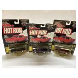 Three Racing Champions Hot Rod Die-Cast Cars in Or