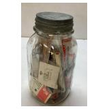 Jar Full of Vintage Sewing Notions in Glass Contai