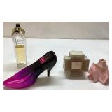 Three Decorative Items and One Perfume Bottle