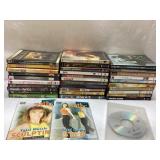 Huge Lot of Mixed DVDs Including Movies and Fitnes