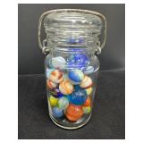 Vintage Glass Jar With Handle Containing Assorted