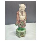 Porcelain Figurine of Bearded Elder on Decorated P