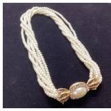 Multi-Strand Pearl Bead Necklace With Decorative C