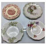 Four Decorative Dessert Plates with Floral and Sce