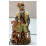 Ceramic Figurine Depicting Bearded Man with Child