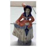 Hand-Painted Porcelain Figurine of Woman with Bonn