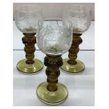 Three Etched Glass Goblets with Amber Stems