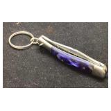 Folding Pocket Knife with Purple Handle and Key Ri
