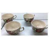 Four Porcelain Teacups with Floral and Fruit Desig