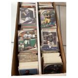 Unchecked Football Cards in Storage Box