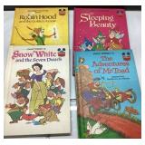 Four Walt Disney Hardcover Books Featuring Classic