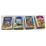 Four Disney VHS Tapes Featuring Classic Films