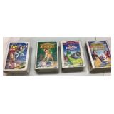 Four Walt Disney VHS Movie Tapes in Original Cases