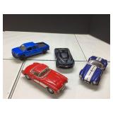 Four Metal Vehicles Approximately 5 Inches