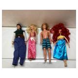 Four 12-Inch Dolls Featuring Male and Female Figur