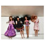 Four 11-Inch Dolls in Various Outfits