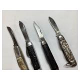 Four Folding Pocket Knives with Various Handles