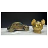 Vintage Metal Volkswagen Beetle and Lion Head Bank