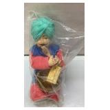 Handcrafted Figurine of a Man with Turban Holding