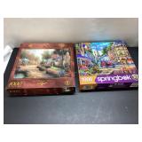 Two 1000-Piece Puzzles by Thomas Kinkade and Sprin