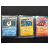 3 Foil Pokemon Cards Featuring Milotic, Zekrom, an