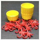 Barrel of Monkeys Game with Yellow Barrel and Red