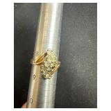 Gold Ring with Cluster of Diamonds in a Frame Desi