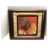 Framed Artwork Featuring Monstera Leaves on a Red