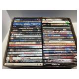Large Assorted Box of DVDs with Multiple Titles an