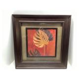 Framed Artwork Featuring Golden and Black Leaf Mot