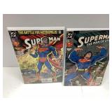 Two Superman Comic Books in Protective Sleeves