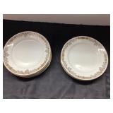 9 Limoges Approximately 6-Inch Plates with Floral