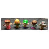 Five Plastic Figurines with Various Outfits