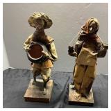 Rustic Figurines With Fabric Clothing on Wooden Ba