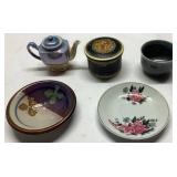 Ceramic Teapot, Bowls, Plates, and Metal Container