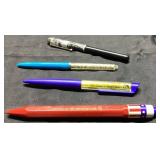 Four Assorted Writing Pens with Varied Designs