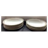 11 Limoges 10-Inch Plates, One Chipped