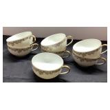 Six Limoges Cups with Gold Trim and Floral Design