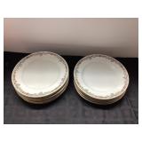 11 Approximately 8-Inch Limoges Plates with Marked